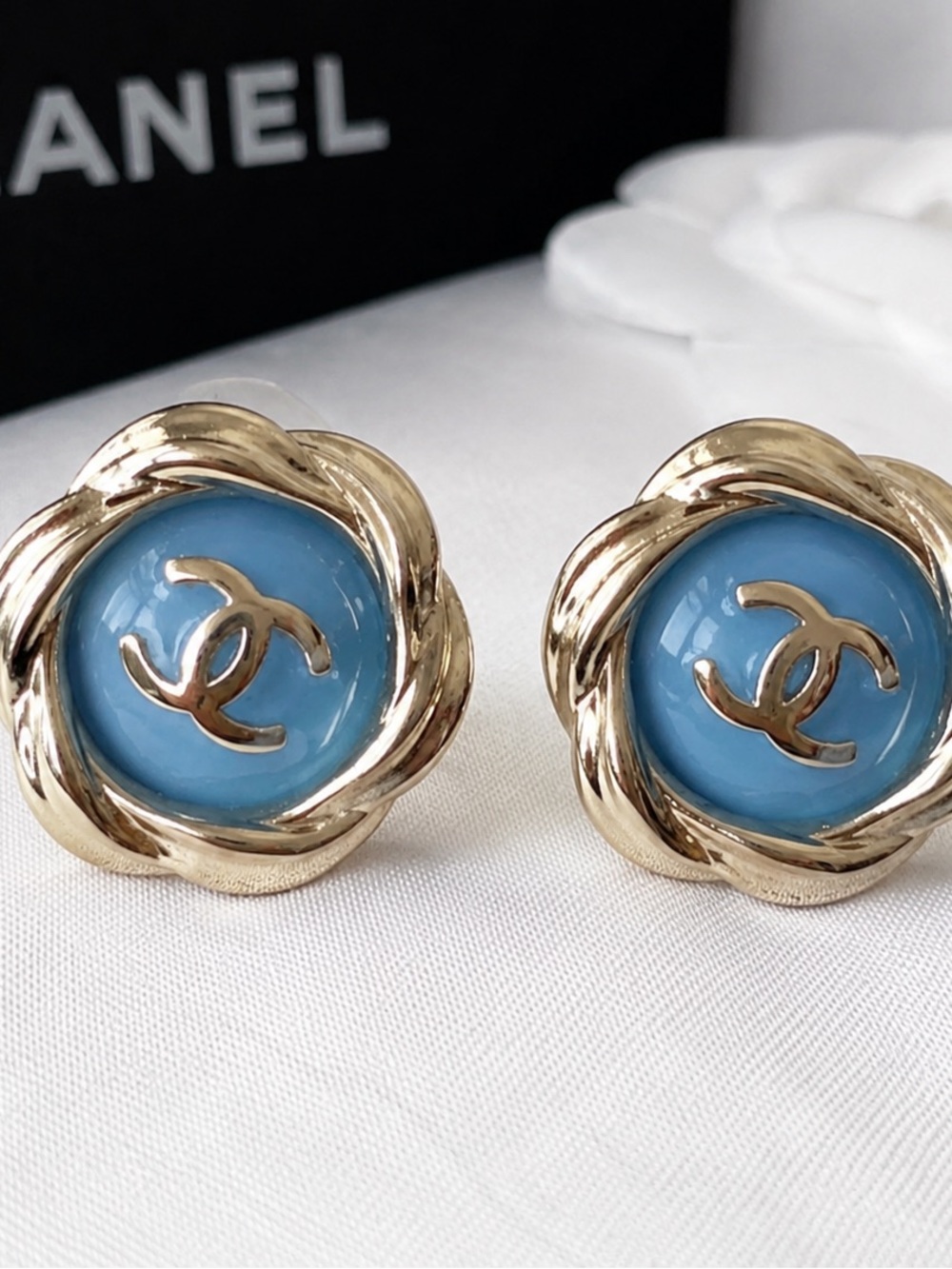 CHANEL Blue and Gold Logo Knot Stud Earrings